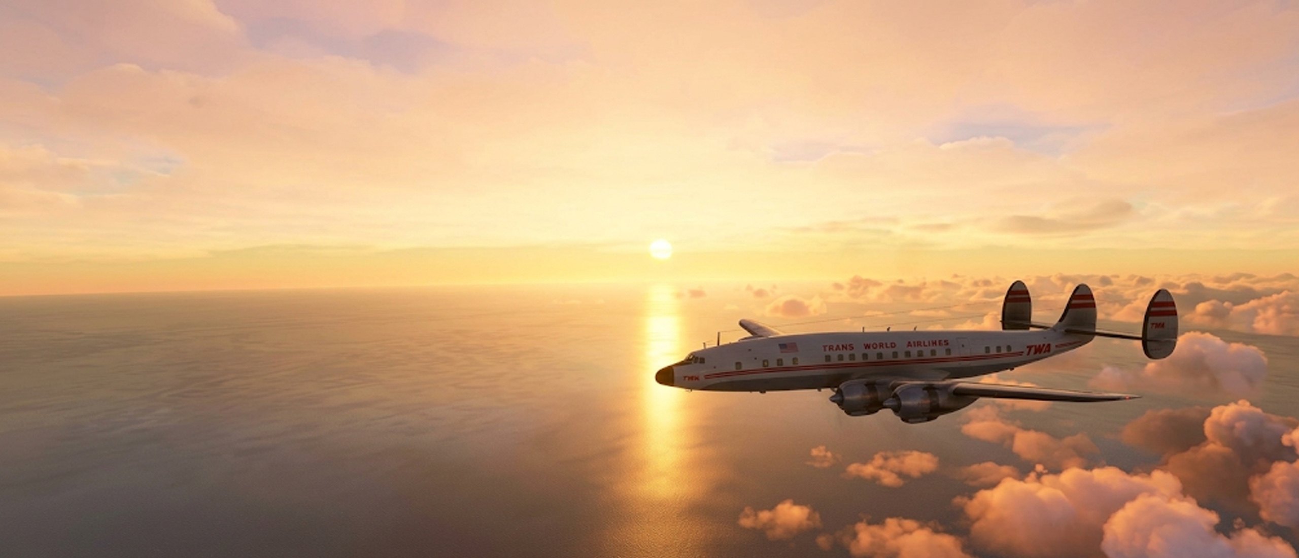 Lockheed L-1049 Super Constellation en vol au coucher du soleil au-dessus de la mer